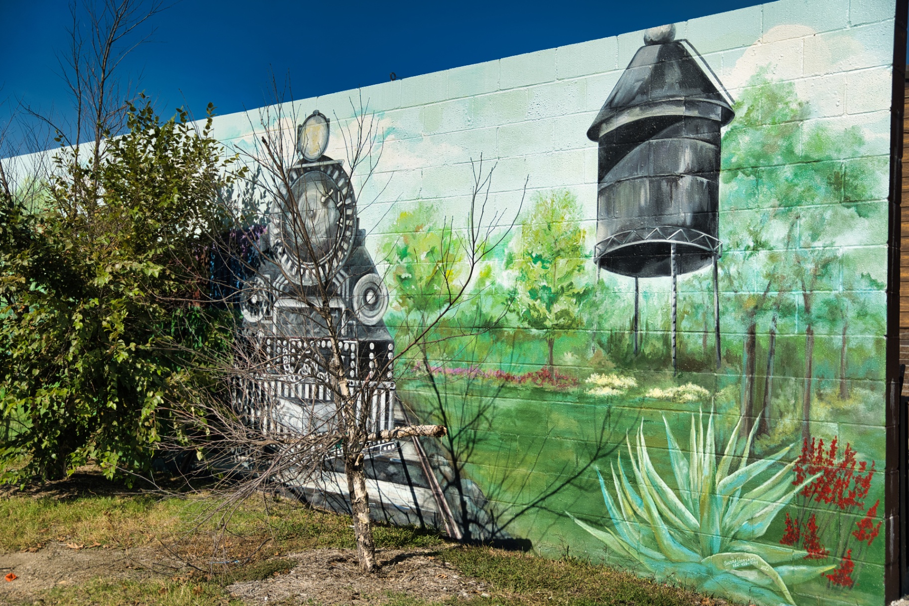 A train-themed mural celebrating Keller's railroad history in Old Town Keller
